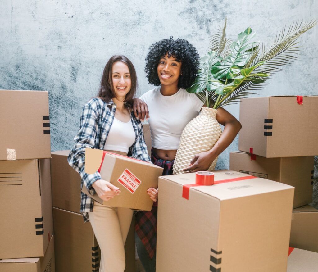 A portrait with two ladies and packages